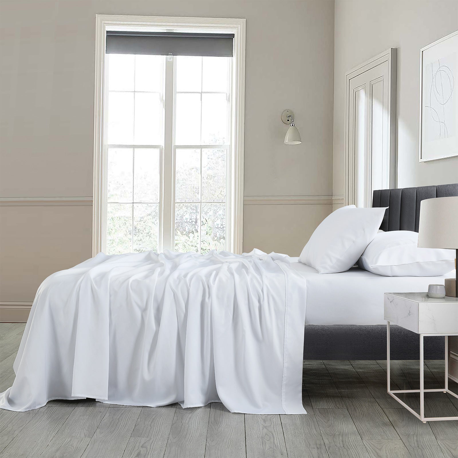 Royal Comfort 600 Thread Count Cooling Ultra Soft Tencel Eucalyptus sheet set featuring a flat sheet, fitted sheet, and pillowcases in a luxurious design.